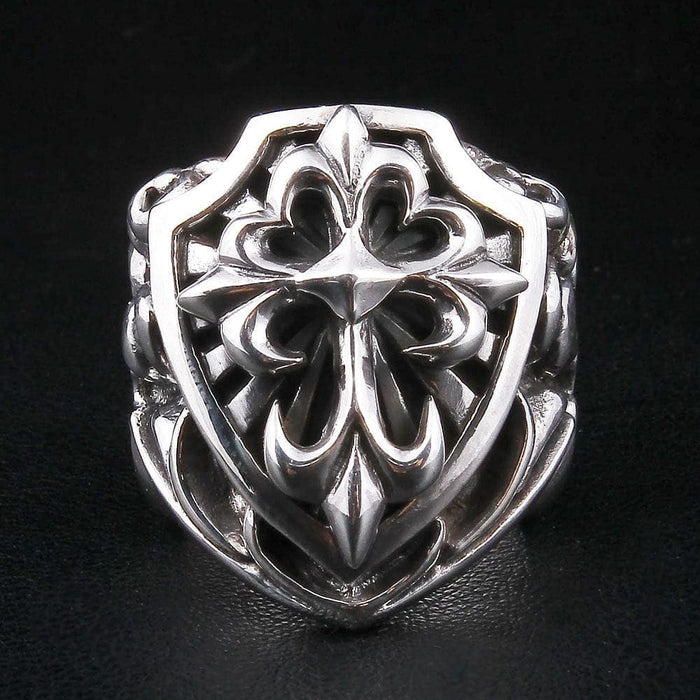 Front view of ornate gothic cross sterling silver shield ring showing 3D relief details