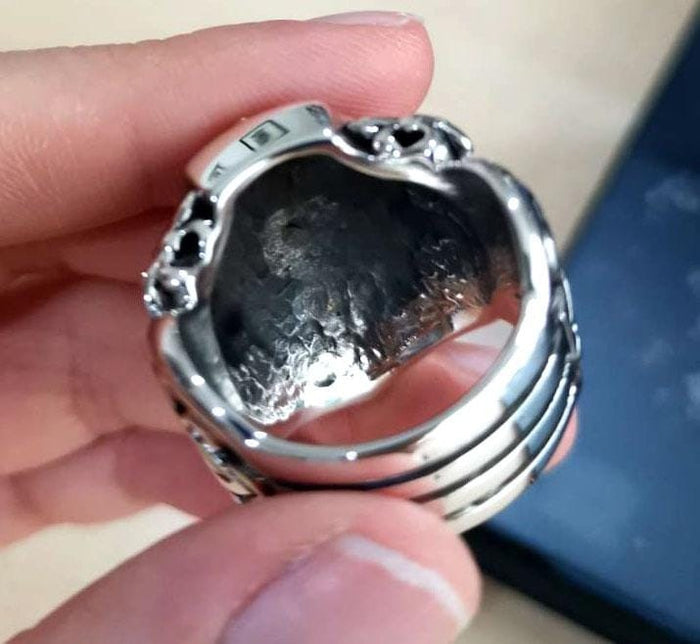 Interior view of handcrafted sterling silver shield of faith ring showing solid construction