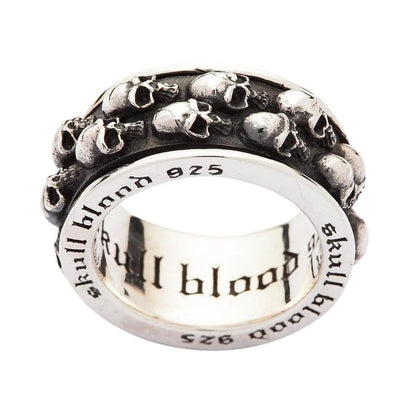 A detailed view of the inside of the skull spinner ring, showing the 'skull blood 925' gothic engraving.
