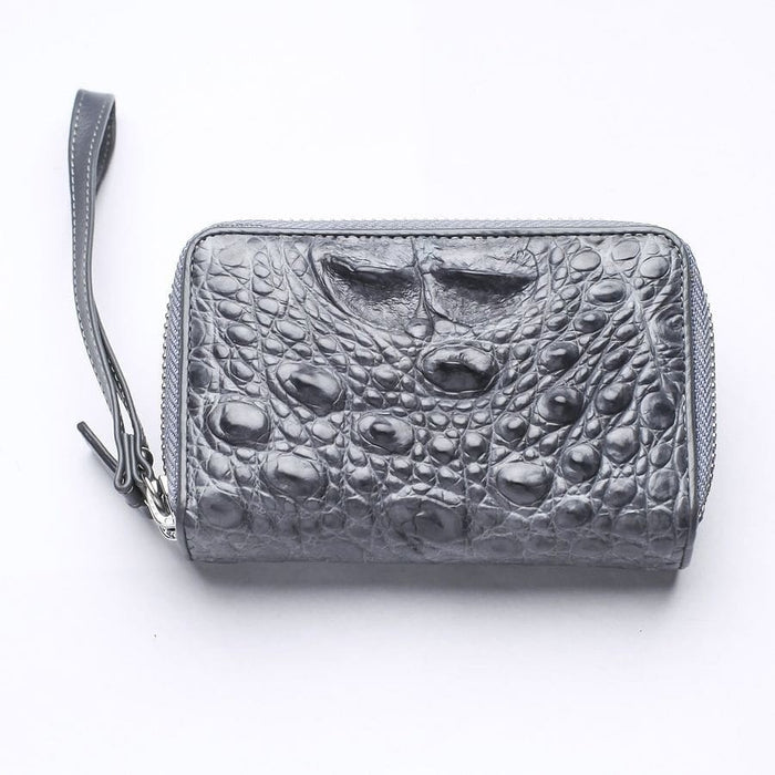 Gray genuine crocodile leather wallet front view showing hornback scale texture