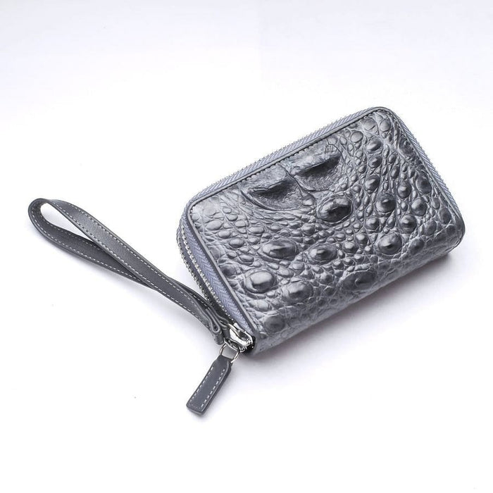 Exotic crocodile leather wallet with gray leather wrist strap attached