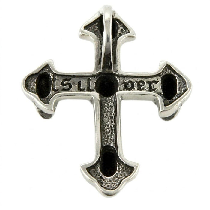 Reverse side of the sterling silver cross revealing a stippled texture, deep hollowed accents, and gothic lettering.