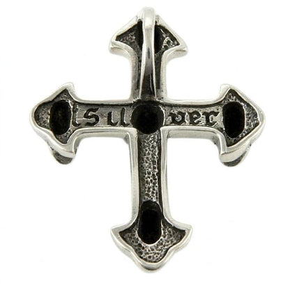 Reverse side of the sterling silver cross revealing a stippled texture, deep hollowed accents, and gothic lettering.