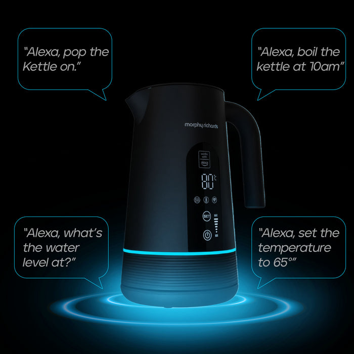 A black Morphy Richards electric kettle with a digital display and blue light accents, shown on a black background with five speech bubbles demonstrating Alexa voice commands.