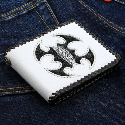 A closed view of the genuine white leather wallet with a black stingray scorpion.