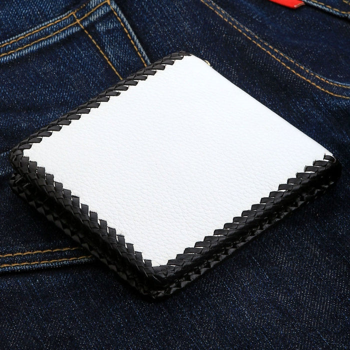 The back of the white cowhide wallet, showing its clean look and black braided edge.