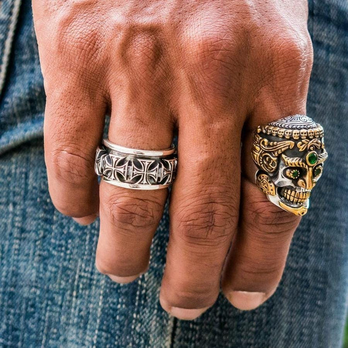The iron cross biker ring worn as part of a rugged, everyday style.