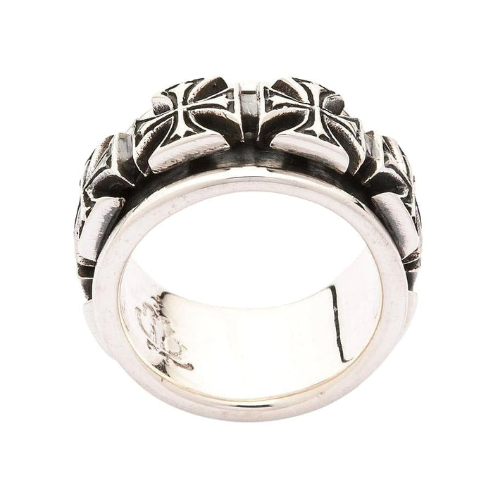 Close-up detail of the handcrafted oxidized finish on the biker spinner ring.