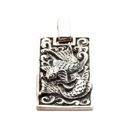 Japanese Koi fish pendant in 925 sterling silver showing detailed front view with oxidized wave design