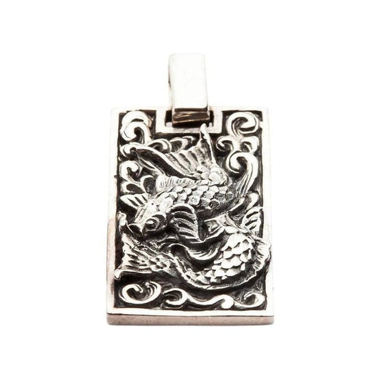 Japanese Koi fish pendant in 925 sterling silver showing detailed front view with oxidized wave design