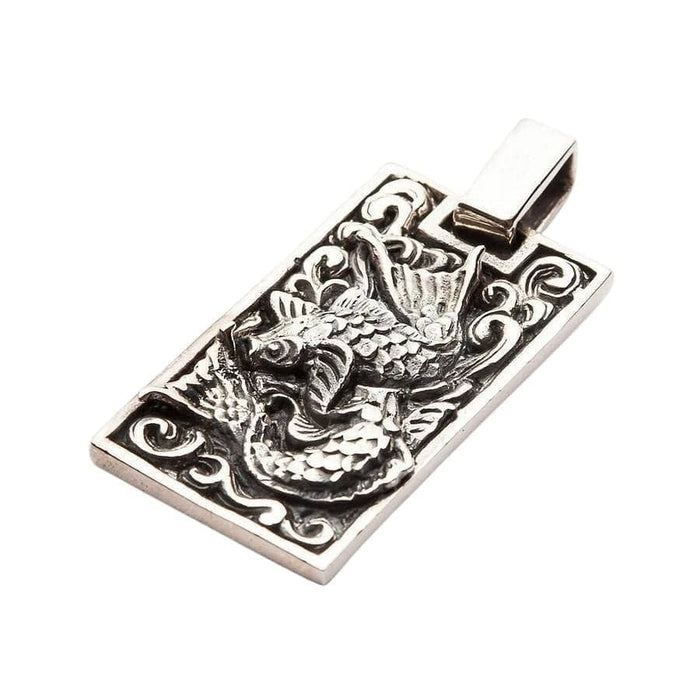 Angled view of handcrafted Koi fish sterling silver pendant highlighting 3D scale texture and fins