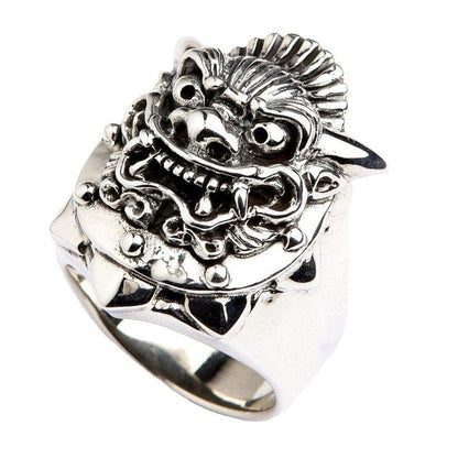 Oxidized sterling silver Hannya mask ring with snarling fangs, hollow eyes, and ornate horned detail on wide band