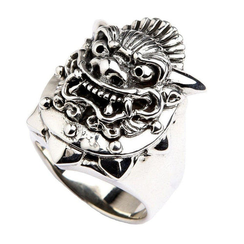 Oxidized sterling silver Hannya mask ring with snarling fangs, hollow eyes, and ornate horned detail on wide band