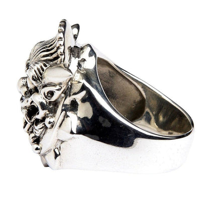 Side profile of heavy Hannya mask ring revealing hollow interior, sculpted horn and brow ridge in oxidized .925 sterling silver