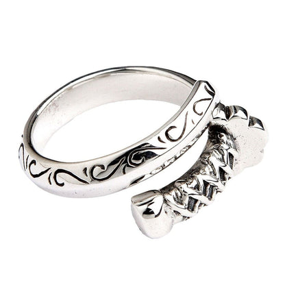 A side profile of the samurai sword ring, showing the open split-band design and engraved details.