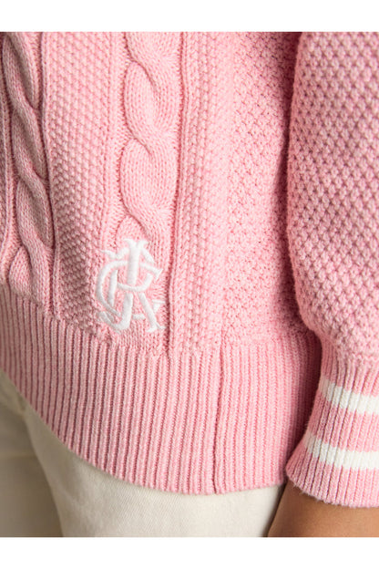 Close-up of textured knit and ribbed hem on Joules W25282 Dibly Cable Knit Jumper – Pink by Joules. Shop Joules at Dotique.