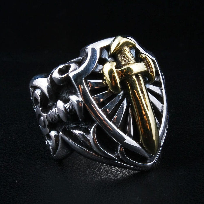 A side profile of the heavy silver knight ring, showcasing the intricate gothic openwork on the band.