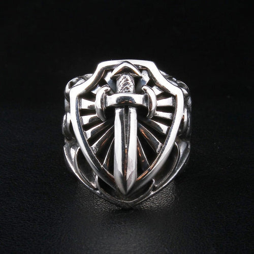 Front view of solid silver heater shield ring with sword emblem
