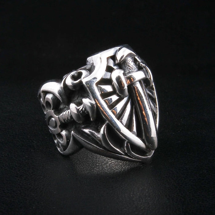 Side profile of ring showing intricate gothic and Celtic band carvings
