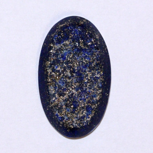 Lapis Lazuli. Rough face with many sparkling Golden Pyrite inclusions