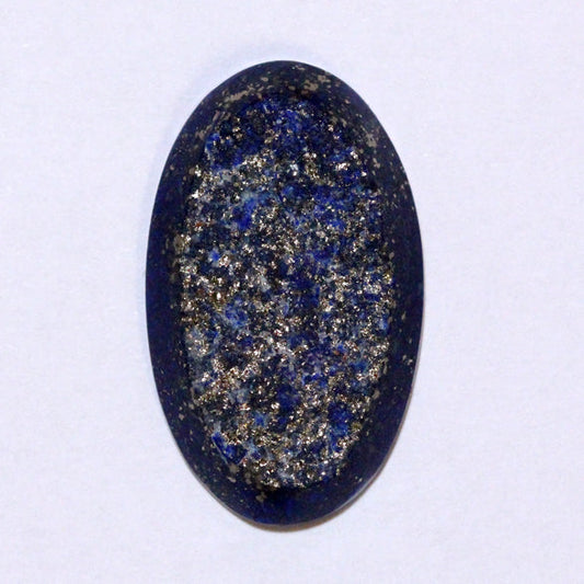 Lapis Lazuli. Rough face with many sparkling Golden Pyrite inclusions