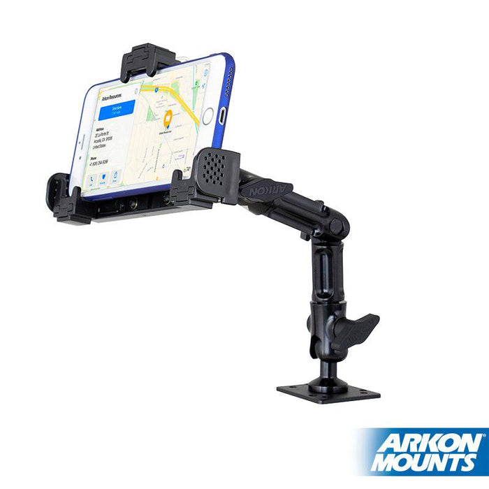 A LockVise™ Locking Phone Mount with 4-Hole AMPS Drill Base holds a smartphone displaying a map. The black adjustable mount is attached to a flat surface, with the Arkon Mounts logo visible in the bottom right corner.
