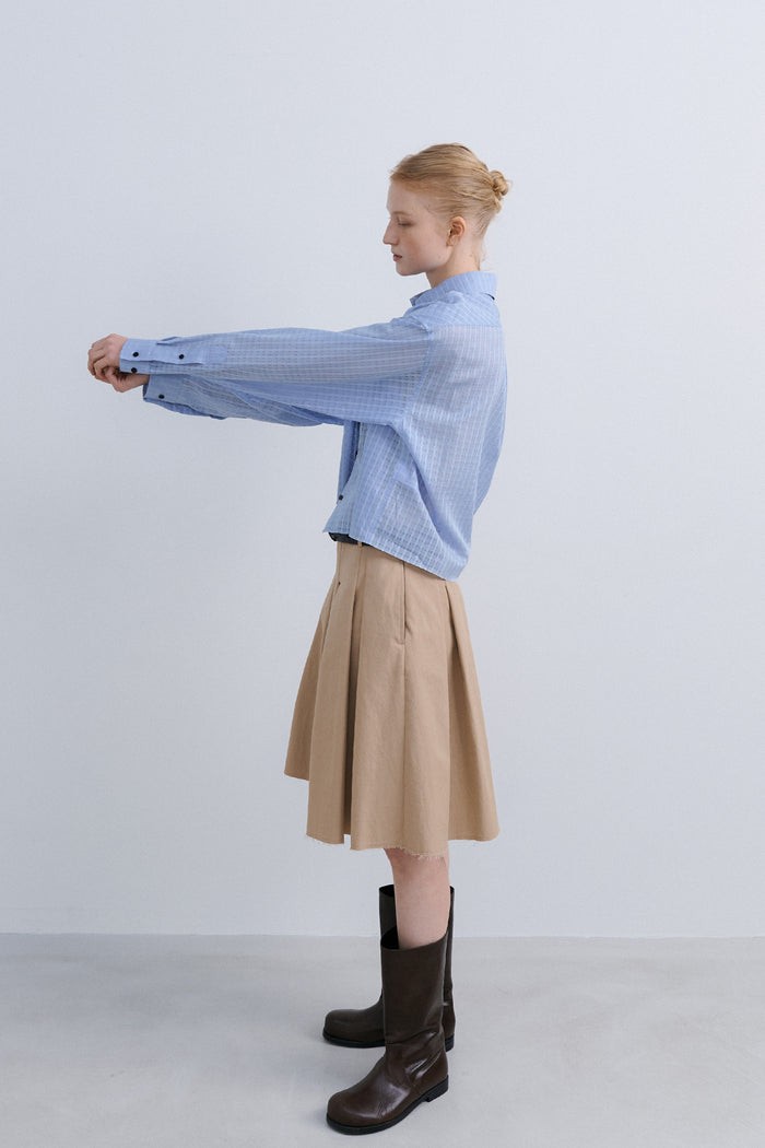 LOW EDGE PLEATED SKIRT - BEIGE