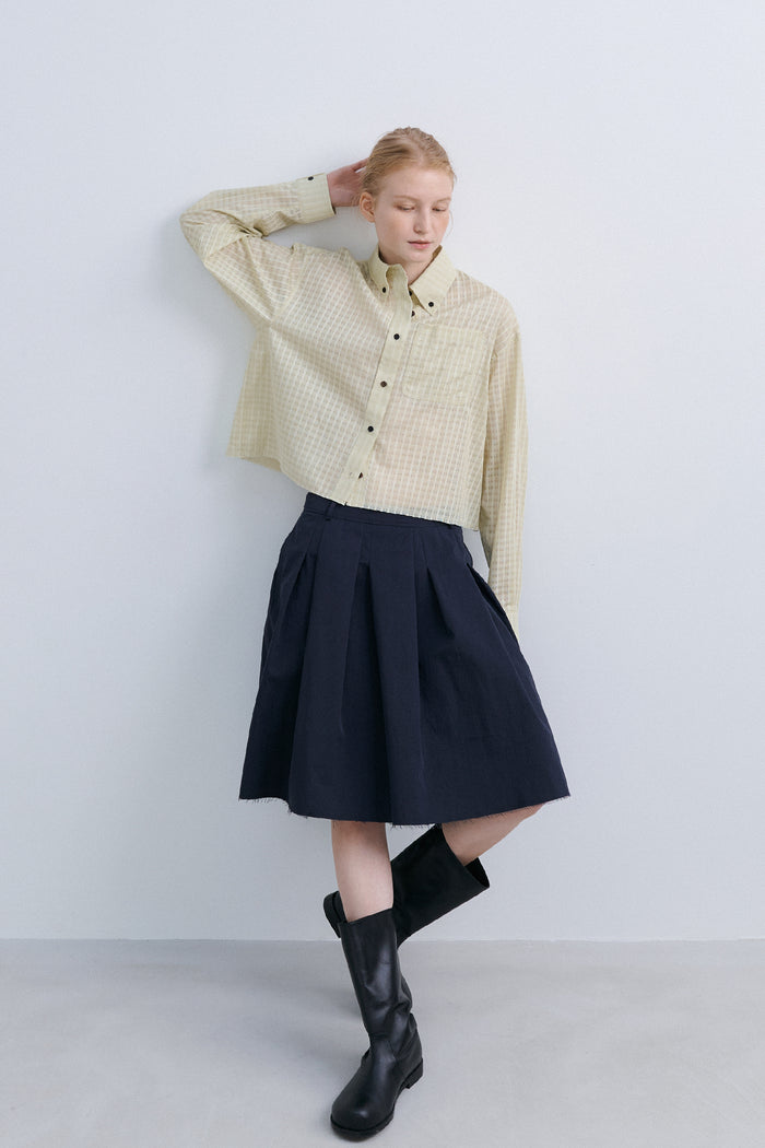 LOW EDGE PLEATED SKIRT - NAVY