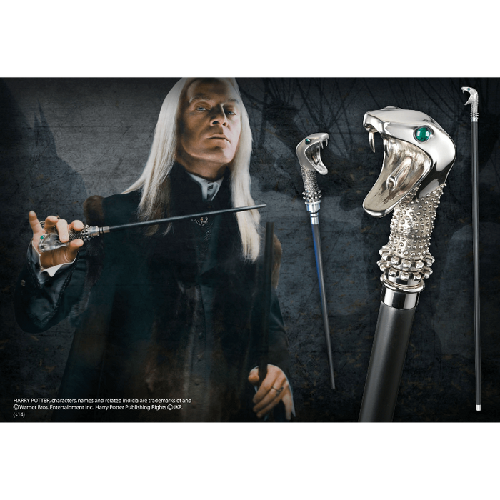Ceremonial wand with snake head design held by Lucius Malfoy, with a dark background.