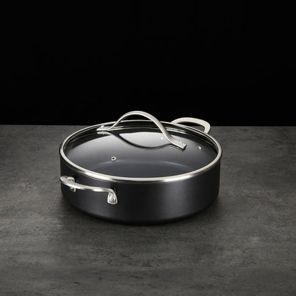 28cm Aluminium Non-Stick Shallow Casserole Dish on a granite countertop