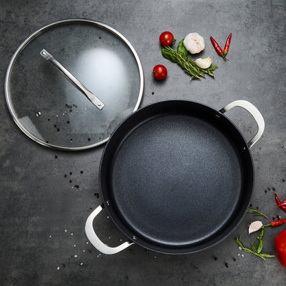 28cm Aluminium Non-Stick Shallow Casserole Dish on a granite countertop