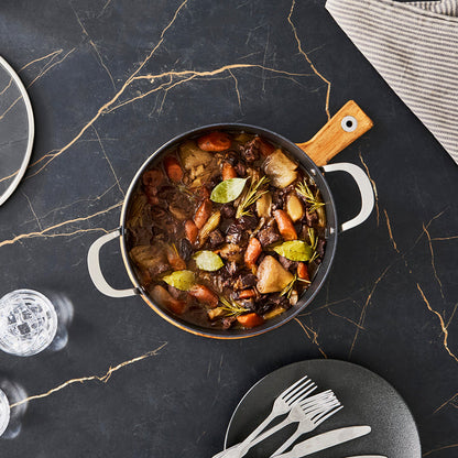 Beef stew inside a 28cm Aluminium Non-Stick Shallow Casserole Dish