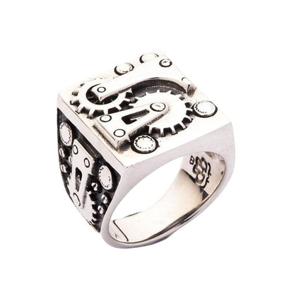 Close-up of the industrial engine-inspired details on the men's biker ring.