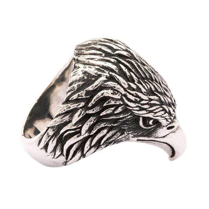 Three-quarter angle view of solid sterling silver eagle ring highlighting dimensional feather work