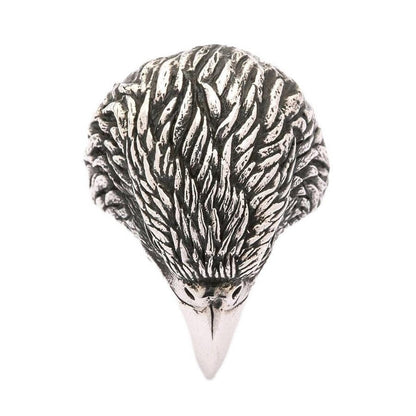 Top-down view of sterling silver eagle ring displaying symmetrical feather pattern and beak alignment