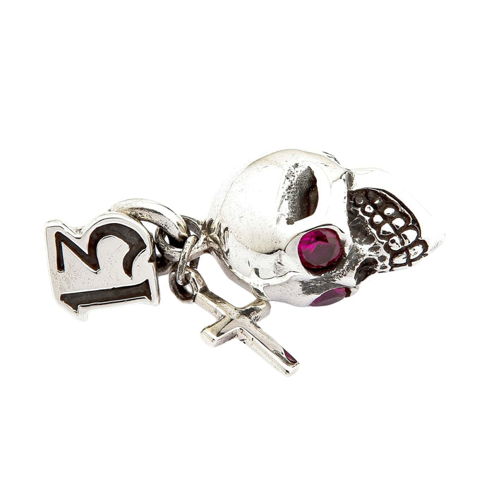 The solid silver number 13 skull pendant with a cross charm, isolated on a white background.