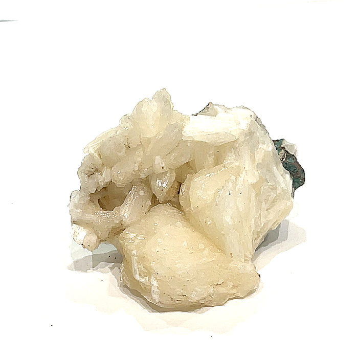 #7 Stilbite on a white background, front view.
