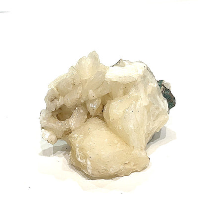 #7 Stilbite on a white background, front view.