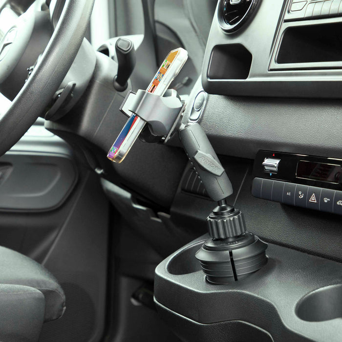The RoadVise® Ultra Holder with Cup Holder Mount is positioned beside the driver’s seat and dashboard controls, providing easy hands-free access to your phone or tablet while on the road.