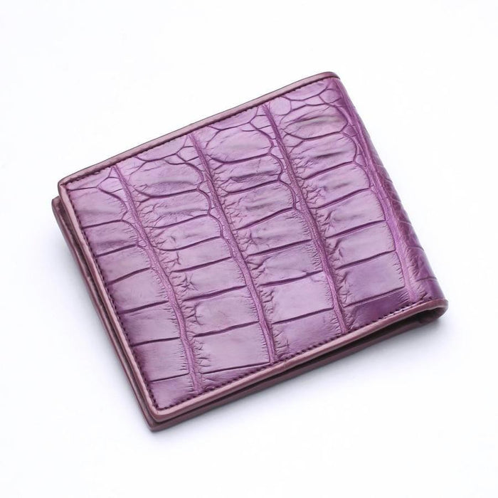 Angled exterior shot highlighting the textured scales of the plum-dyed crocodile hide.