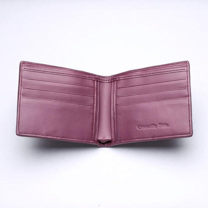 Smooth plum leather interior displaying symmetrical card slots and an embossed Crocodile Skin stamp on the right panel.