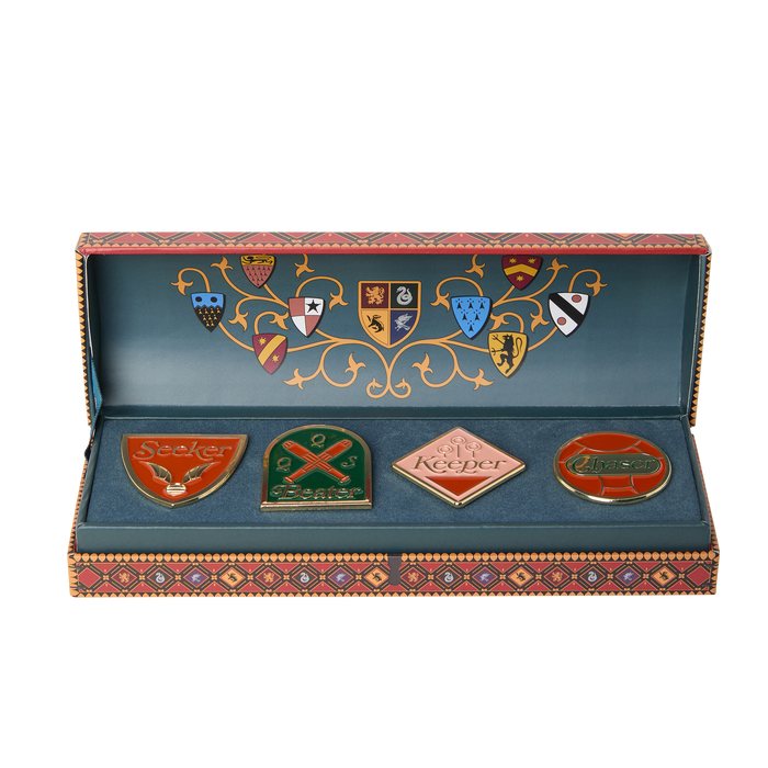 Set of four Quidditch emblems in a decorative box with intricate designs