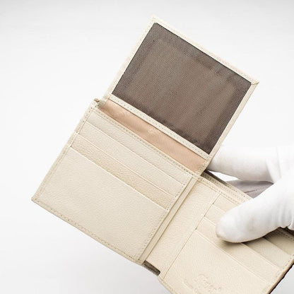 A close-up of the interior, showing the 10 credit card slots and 2 ID windows with mesh.