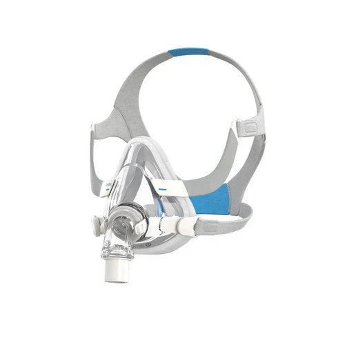 ResMed AirTouch F20 full-face CPAP mask with soft grey headgear, blue accents, and a clear silicone cushion, on a white background.
