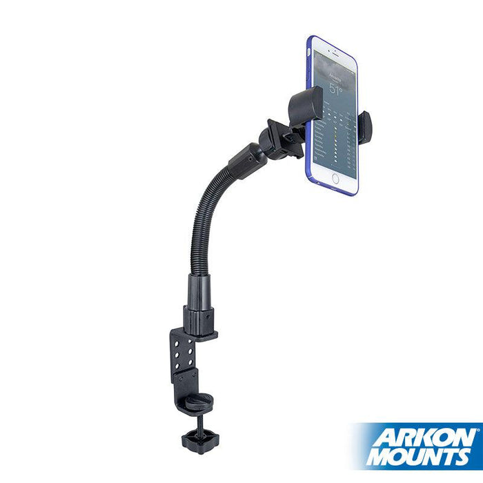 The RoadVise® Phone Holder with Clamp Mount and 12-inch Gooseneck securely attaches to a desk or table edge, holding your smartphone upright. The Arkon Mounts logo appears in the bottom right corner.