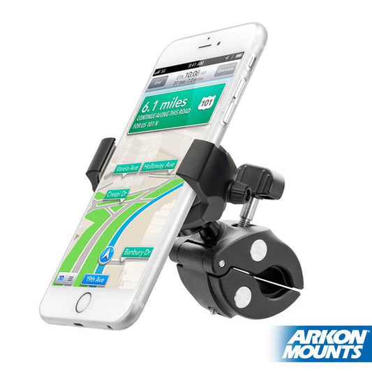 A smartphone is mounted on the RoadVise® Ultra Phone and Tablet Clamp Post Mount for Handlebars and Posts, displaying a GPS map. The black device holder clamps securely onto a handlebar, with the Arkon Mounts logo in the corner.