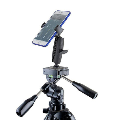 A smartphone mounted on a tripod with the Mobile Grip 5 Tripod Phone Mount displays a weather app. The tripod has two adjustable handles for precise positioning.