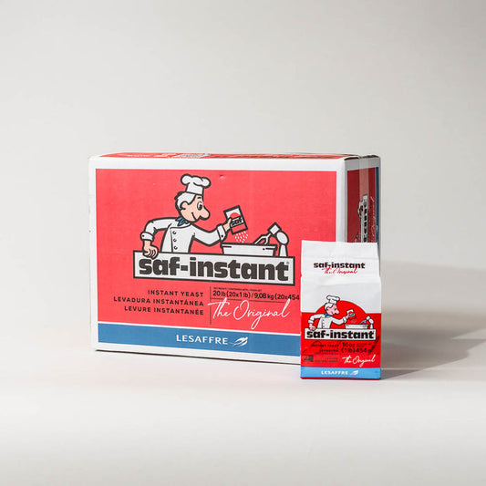 20-pack case of Saf Instant Yeast on a grey background