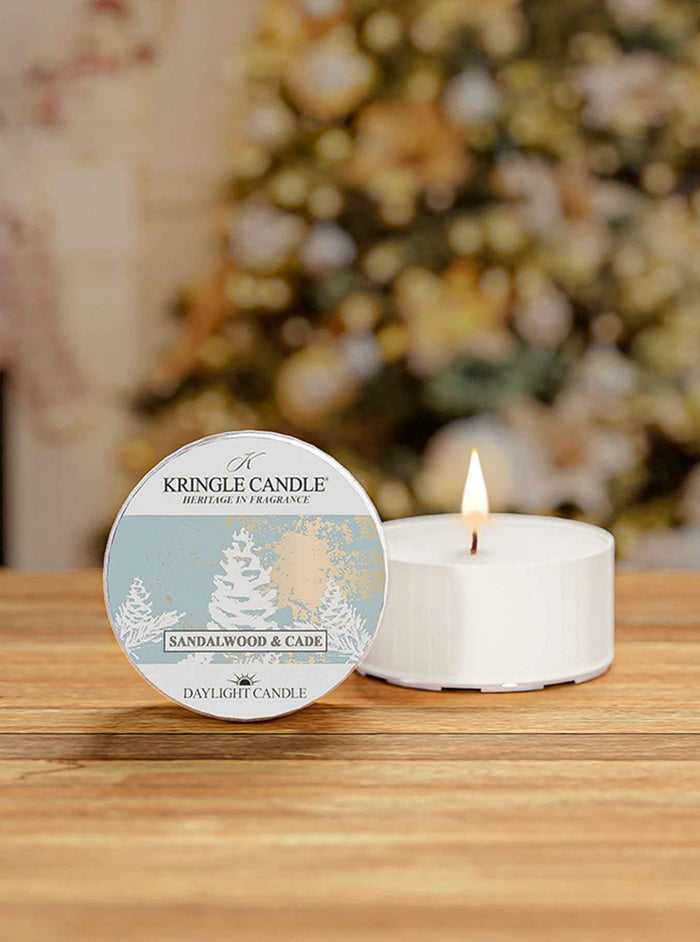 Sandalwood and Cade DayLight candle with a holiday background