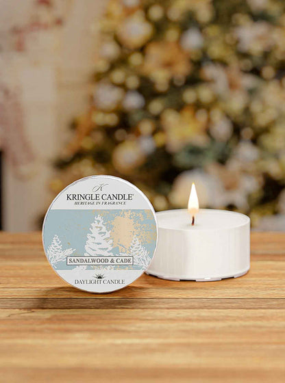Sandalwood and Cade DayLight candle with a holiday background